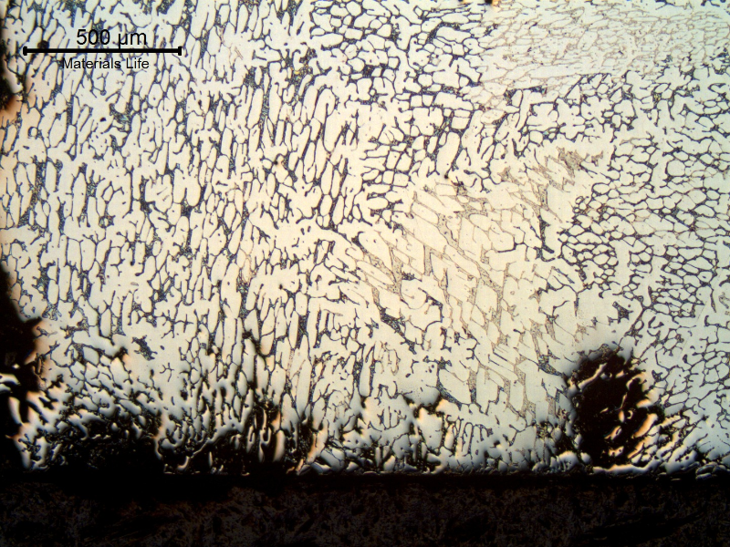 Longitudinal section micrography at the cracked position, close to the internal surface of the flange (exposed to the corrosive fluid), showing preferential dissolution associated to the microstructure.