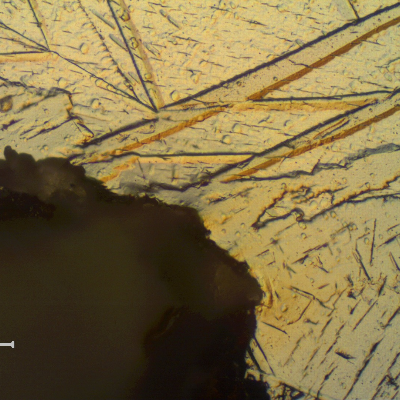 The pipe internal suface, at the welded region, presents no hydride layer (because it has detached) as well as the material itself is suffering brittle detachment.
