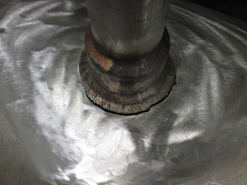 The main pipe, ND 18", has suffered a pipe through wall cracking at the margin of the 1 1/2" branch socket weld.