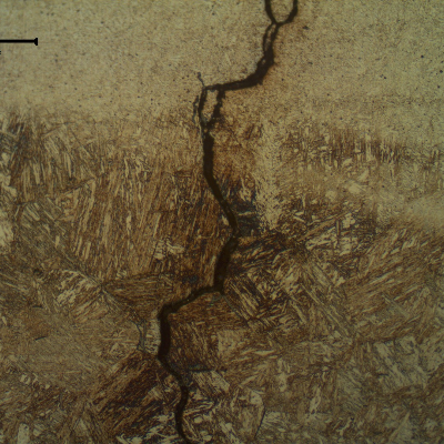 Cold cracking of the fillet weld adopted to attach a flat support into a vessel shell in the internal side, using an unsuitable welding procedure that created a too high hardness HAZ. The cracks are mainly located at the fusion line.