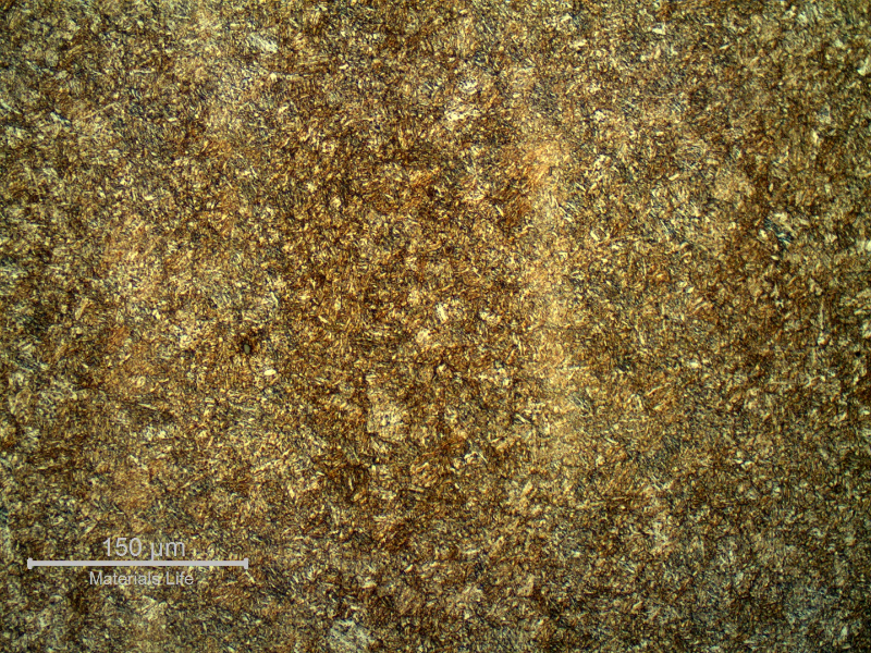 Micrography of the longitudinal section of the pin showing a tempered martensite structure. The pin presented average hardness of 38 HRc in the section.