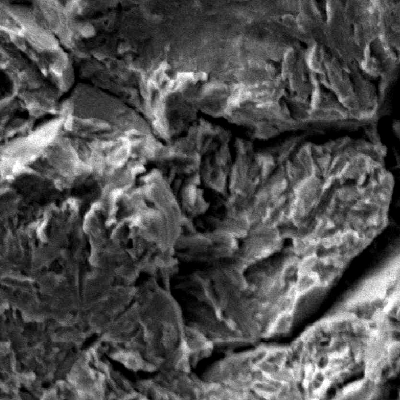 Fractographic detail by SEM of the quasecleavage mechanism in the middle of the wall thickness of the pin.
