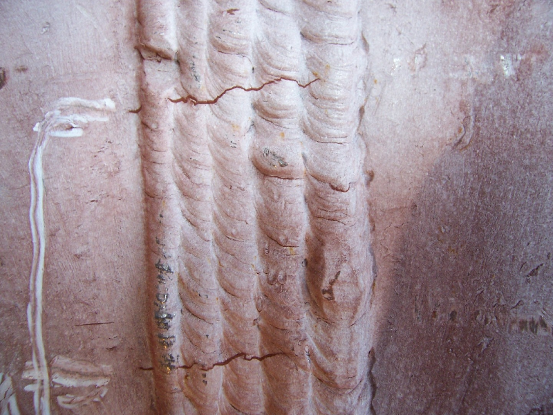 The repair weld presented several cracks in the weld metal, transverse to the weld, detected during inspection using magnetic particle test.  The cracks were mainly located in regions of the structure where the repair was conducted by welding in the vertical position using 1/8" stick electrode.