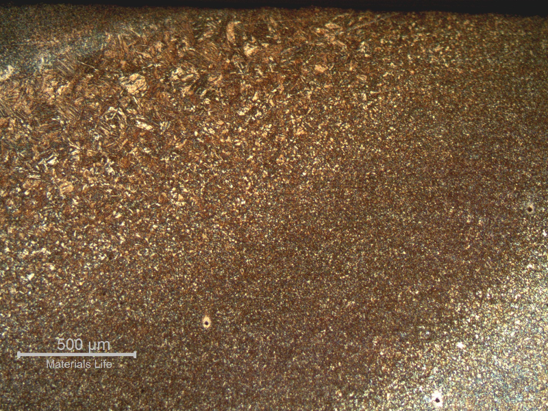 Low magnification micrography of a transverse section of the weld at the heat affected zone region.
The macrosection was hardness tested and the base metal hardness is 27HRc, the HAZ is 32HRc and the weld metal is 45HRc, revealing something wrong in the weld metal at the position close to the cracked area.