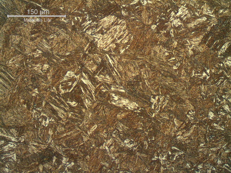 High temperature heat affected zone of the plate, welded in repair. The micrography was taken from a sample collected close to the cracked region, but not containing any macroscopic cracking.