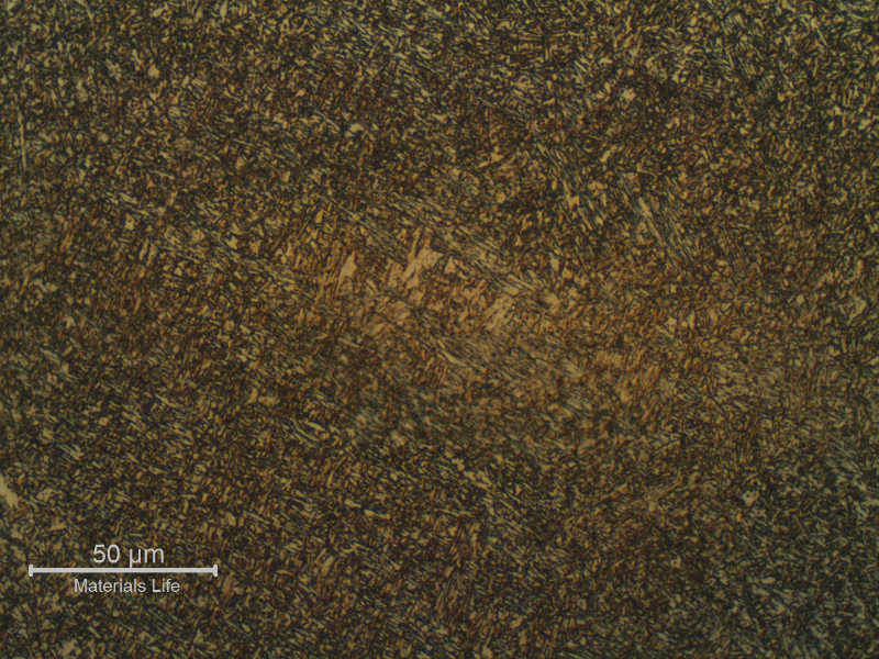 Detail of the weld metal, hard, presenting a martensitic structure.