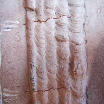 The repair weld presented several cracks in the weld metal, transverse to the weld, detected during inspection using magnetic particle test. The cracks were mainly located in regions of the structure where the repair was conducted by welding in the vertical position using 1/8" stick electrode.