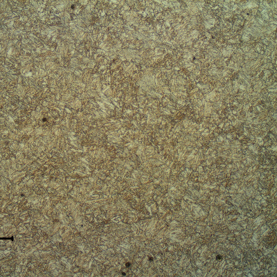 Tempered martensitic structure of the plate base metal.