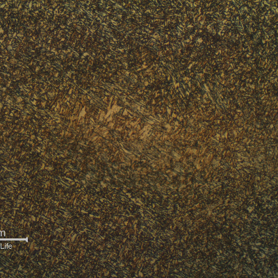 Detail of the weld metal, hard, presenting a martensitic structure.