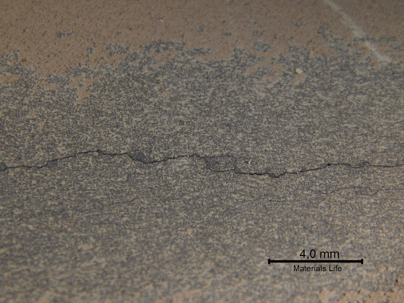 The fitting presented through wall cracks that lead to leaking.  The internal aspect of the surface is presented where the cracks were still in the begining.