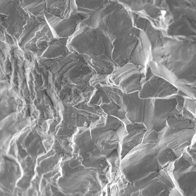 After opening the crack the fracture surface presented different aspects close to the internal surface and through the wall propagation.  Intergranular at the surface, showing intergranular SCC mechanism, and transgranular with striation, showing the contribution of pulsing loads.
