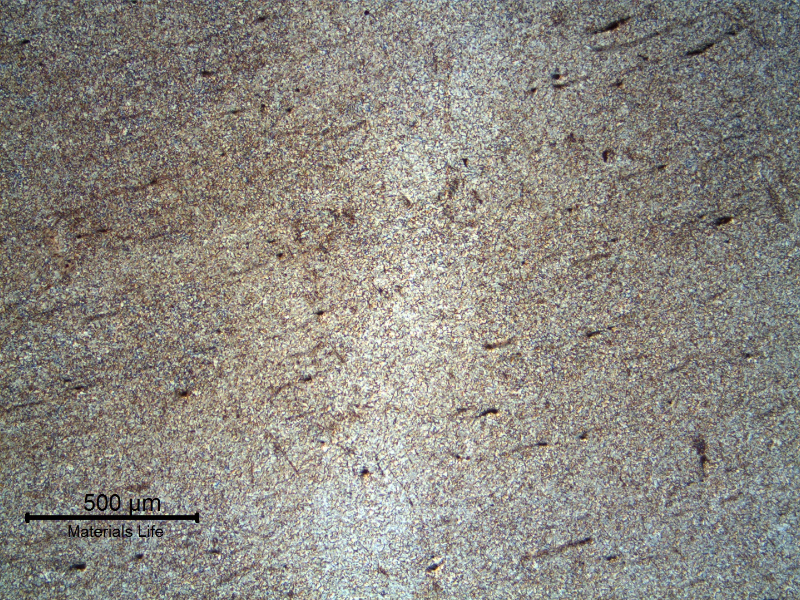 Micrography of a longitudinal section of the mooring chain at the flash welded region. The banded structure is deformed by the upset, close to the weld metal that is ferritic-bainitic.