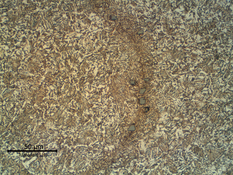 Micrographic detail of the microcracks associated to segregated regions in a network morphology, probably due to the flash welding temperature and upset.