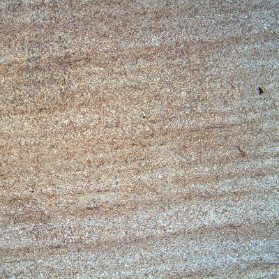 Micrography of a longitudinal section of the mooring chain in the base metal. The low magnification reveals the banded structure of the rolled bar. The base metal microstructure is bainitic..