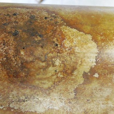 The external surface of the 2" diameter pipe is rusted and the leakage is associated to “holes” that appear very small at the surface but that open a large hole in the middle of the thickness.