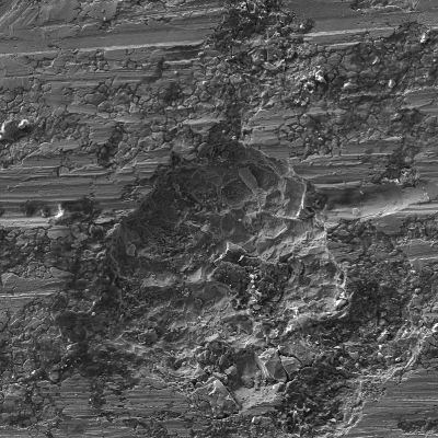 Image of the external surface of the pipe presenting regions of localized corrosion (in the beginning) and deposits