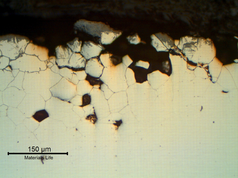 The micrography of the transverse section of the plate, as polished, close to the surface.  The material presents intergranular corrosion and some grains were lost.