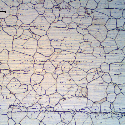 Microstructure of the plate in the center of the ¼” thickness.  Equiaxed austenitic grains with delta ferrite stringers and grain boundary carbide precipitation (sensitization).