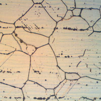 Microstructure of the plate in the center of the ¼” thickness.  Equiaxed austenitic grains with delta ferrite stringers and grain boundary carbide precipitation (sensitization).