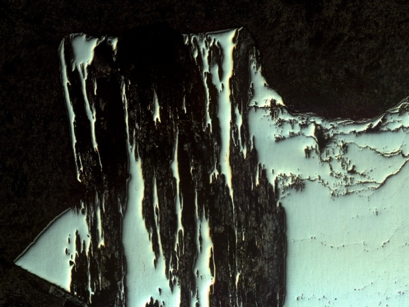 The low magnification micrography of the longitudinal section of the pin shows the localized corrosion associated to the non metallic inclusions.
