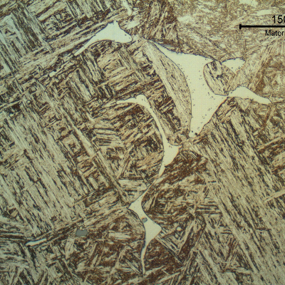 Blade microstructure. Tempered martensite, (probably) retained austenite and delta ferrite islands.