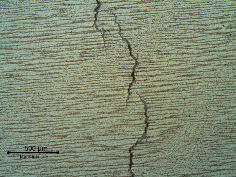 Micrography of the cracking showing the branched nature, typical of a stress corrosion cracking. The cracks started from the internal surface of the steam drum.