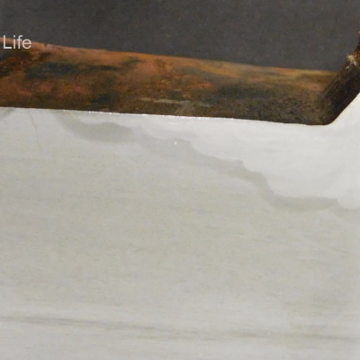 The macrography of a longitudinal section of the shell plate (sample removed from the boiler), at the position of the fillet weld (sealing weld) with a tube, where surface welding repairs created conditions for cracking the base material in a transgranular morphology. Several cracks were identify starting from the steam drum internal surface.