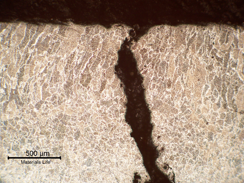 A small sample was removed from the steam drum and the micrography shows that the cracks are intergranular (previous austenite) and located in the weld metal.