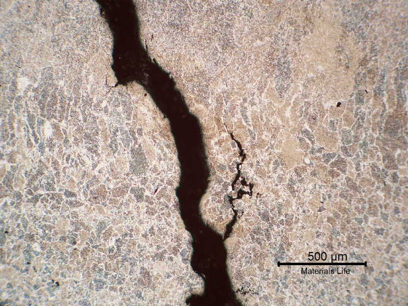 The micrography of the small sample removed from the steam drum shows that the cracks are intergranular (previous austenite) and located in the weld metal.