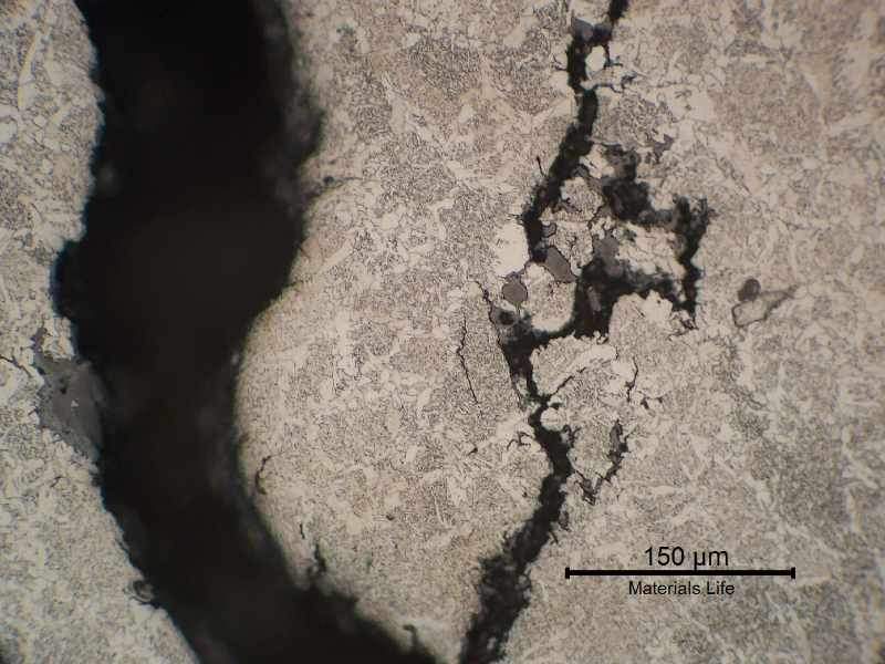 Secondary cracks in the weld metal showing an intergranular morphology. Stress Corrosion Cracking.