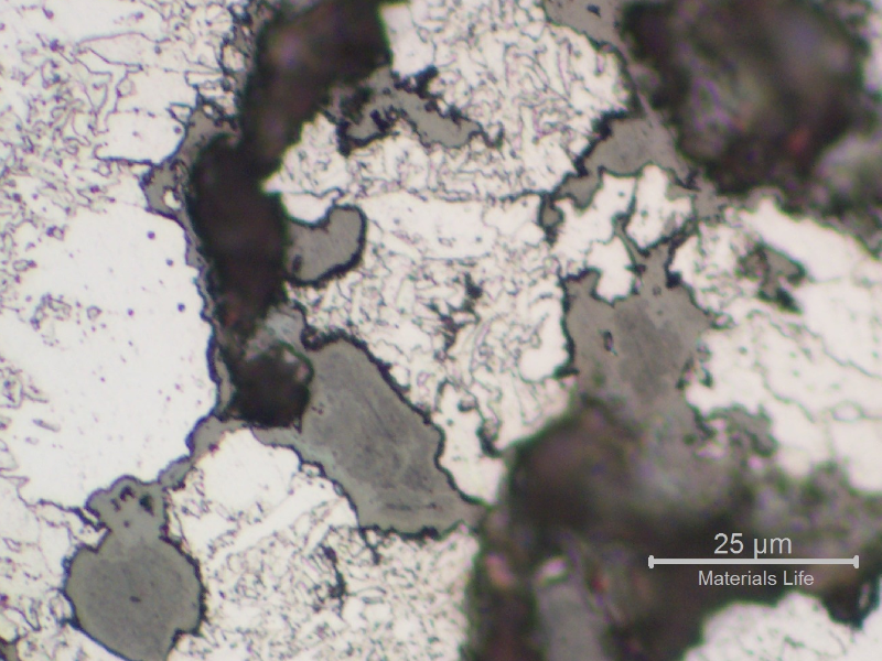 Detail of the intergranular stress corrosion cracking of the drum shell weld repair.