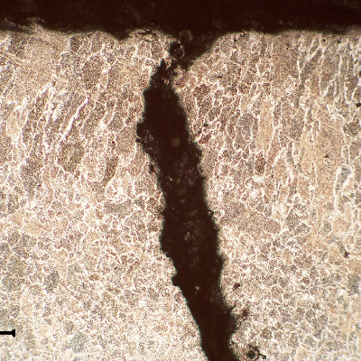 A small sample was removed from the steam drum and the micrography shows that the cracks are intergranular (previous austenite) and located in the weld metal.
