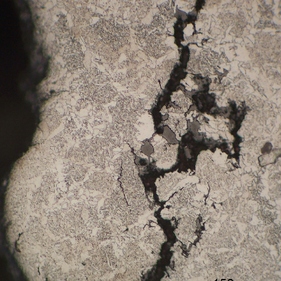 Secondary cracks in the weld metal showing an intergranular morphology. Stress Corrosion Cracking.