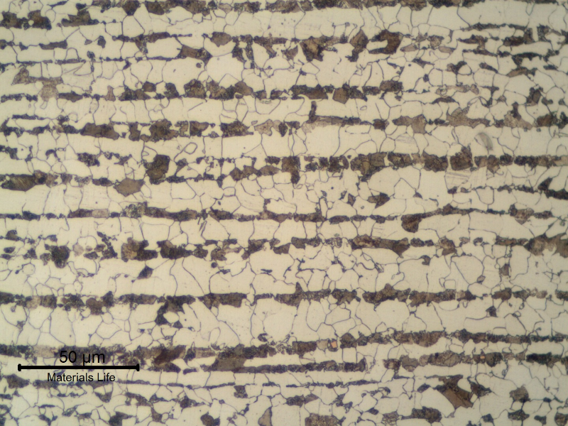 Ferritic perlitic microstructure, banded, in the center of the 5/16" thick C-Mn plate.  Refined Structure.