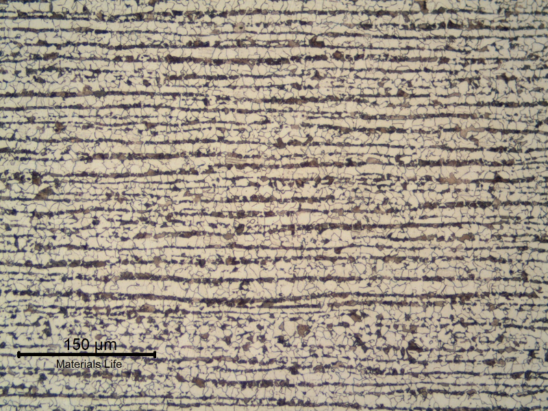 Ferritic perlitic microstructure, banded, in the center of the 5/16" thick C-Mn plate.  Refined Structure.
