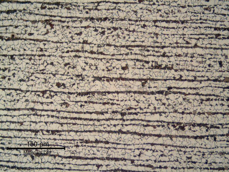Ferritic perlitic microstructure, banded, in the center of the 1/2" thick C-Mn plate.  Refined Structure.