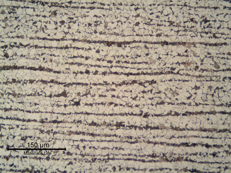 Ferritic perlitic microstructure, banded, in the center of the 5/8" thick C-Mn plate.  Refined Structure.