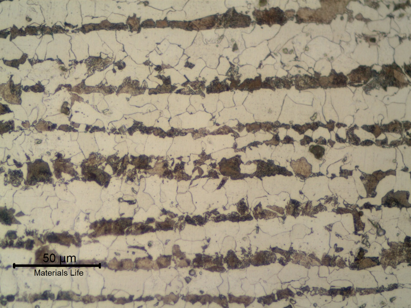Ferritic perlitic microstructure, banded, in the center of the 3/4" thick C-Mn plate.  Refined Structure.