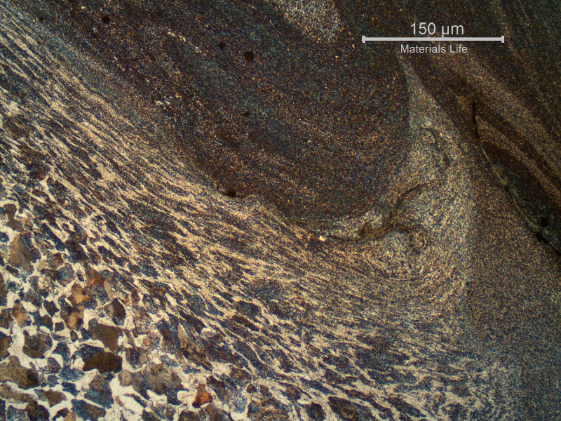 The non hardened surface of the SPUR RACK tooth presents a strong plastic deformation at the metal to metal contact region. There are also evidences of heat transformation due to the heat generated in the sliding.