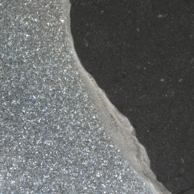 A detail of the macrography, by stereoscope, of the SPUR RACK shows strong plastic deformation at the contact surface.