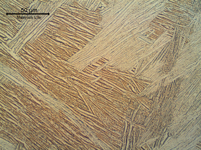 Acicular alpha structure in a biphasic alloy of a large prior beta grain size.  4" diameter bar.