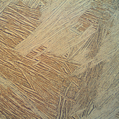 Acicular alpha structure in a biphasic alloy of a large prior beta grain size.  4" diameter bar.