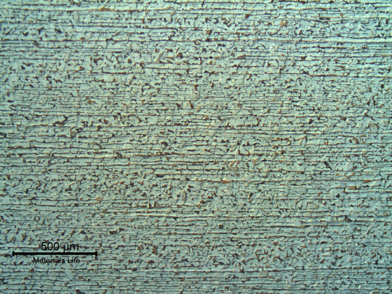 Ferritic-perlitic microstructure of a longitudinal section of the plate that was qualified to be adopted in a tubesheet boiler. Hot formed plate presenting perlite banding.