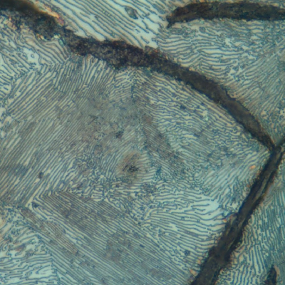 Grey cast iron microstructe. Perlitic matrix and graphite flakes.