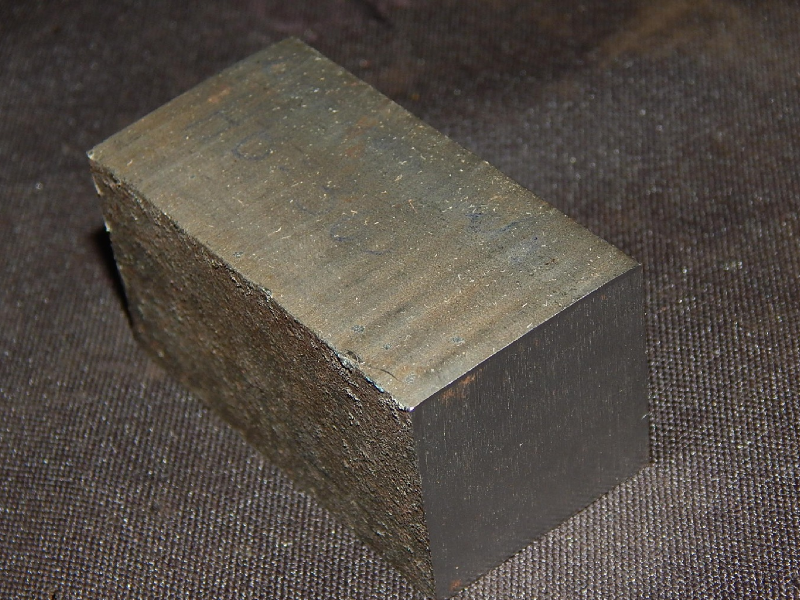 Macroscopic aspect of the cutting surface, slightly irregular. The structural plate is 1 1/4" thick.