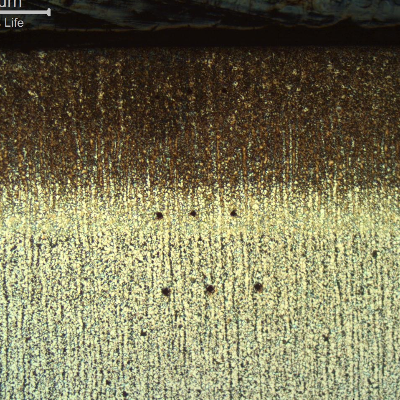 Location of the microhardness tests. The three measurements at the plate base metal showed average hardness of 204 HV 50g. The three measurements of the martensitic structure at the surface showed average 454HV 50g. The intercritical region showed average 324 HV 50g.