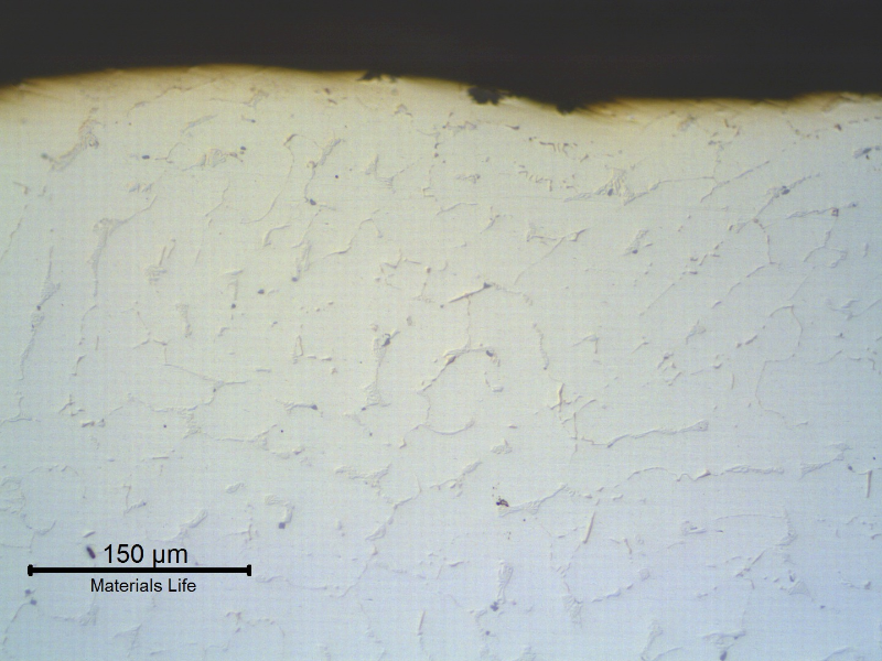 The micrography in the as polished condition of the NEW TUBE shows that there are no casting defects close to the external surface.
