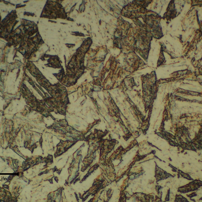 The micrography of the 13Cr SS in the transverse section, far from the collapsed region, shows a uniform tempered martensitic structure.