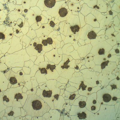 The cast iron microstructure is predominatly ferritic with graphite nodules.