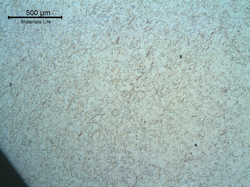 The micrography of a transverse section of the shaft shows the granular austenitic structure close to the surface of the shaft.